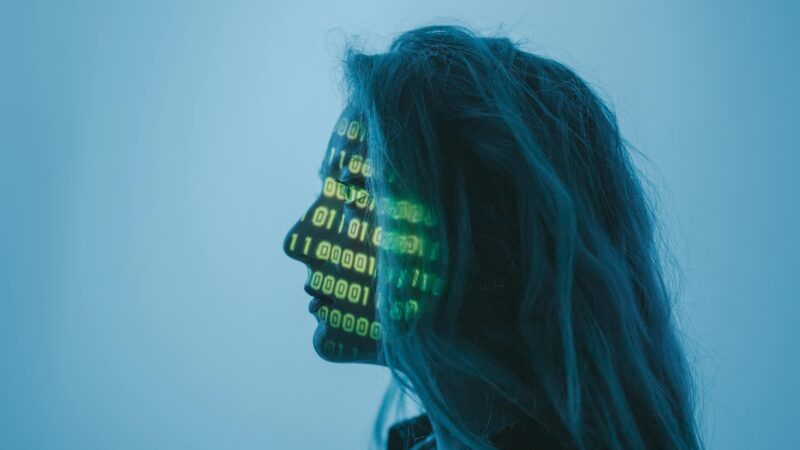 a woman with a binary code on her face