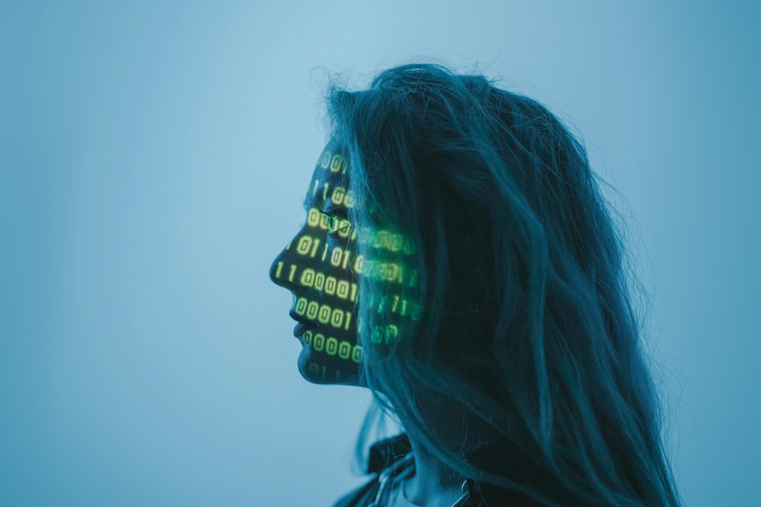 a woman with a binary code on her face