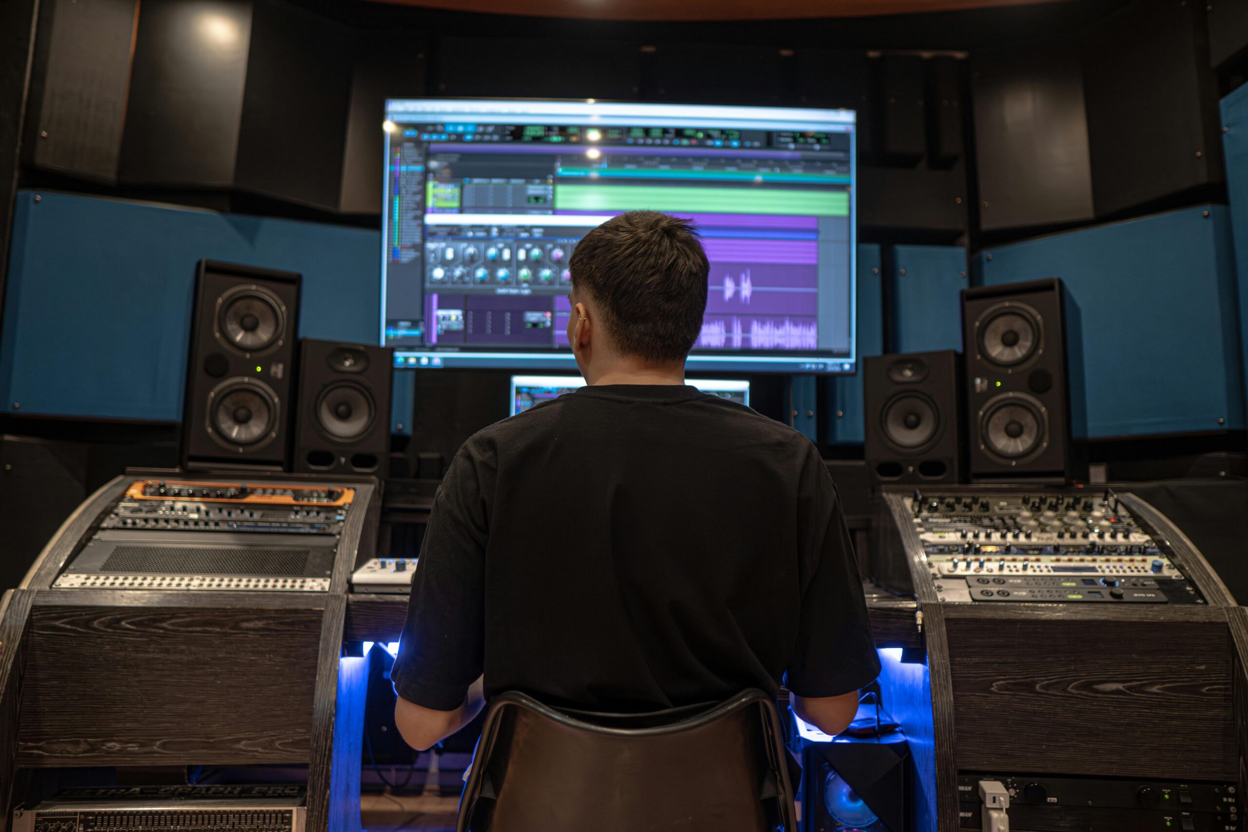 a man sitting in front of a computer