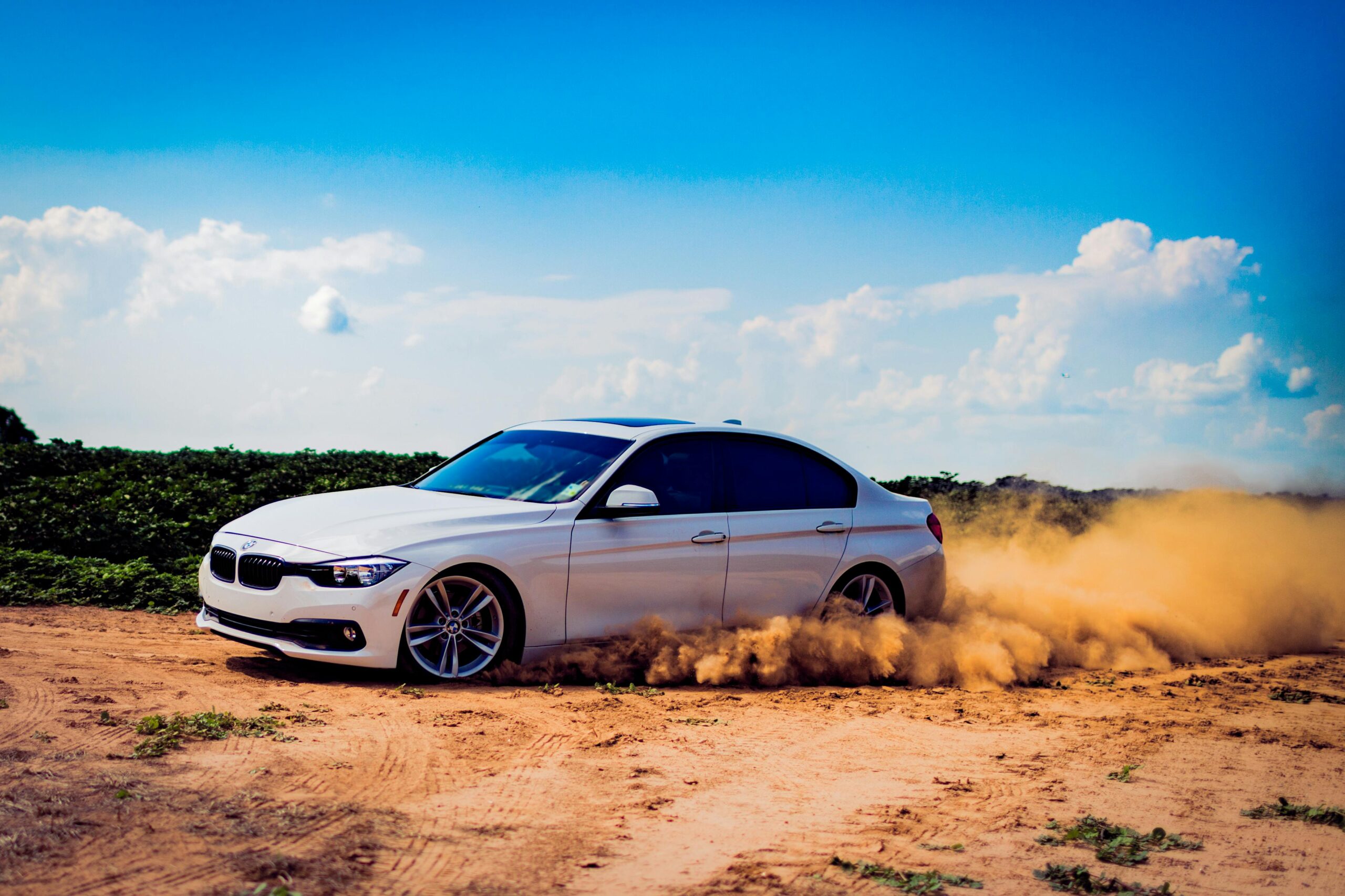 a car driving on a dirt road